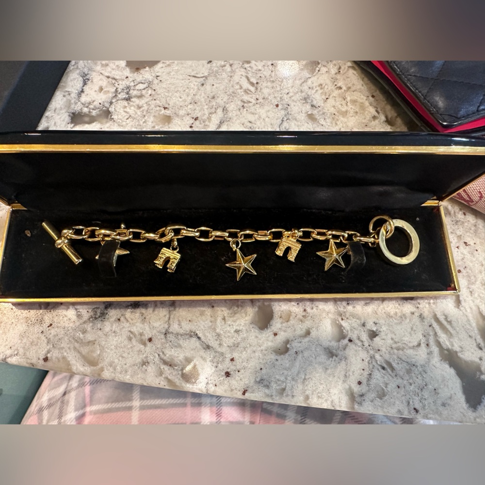 Celine Gold Tone Charm Bracelet with Triomphe and Star Charms